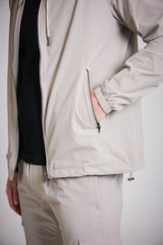 Stone jacket men open over black t-shirt layered